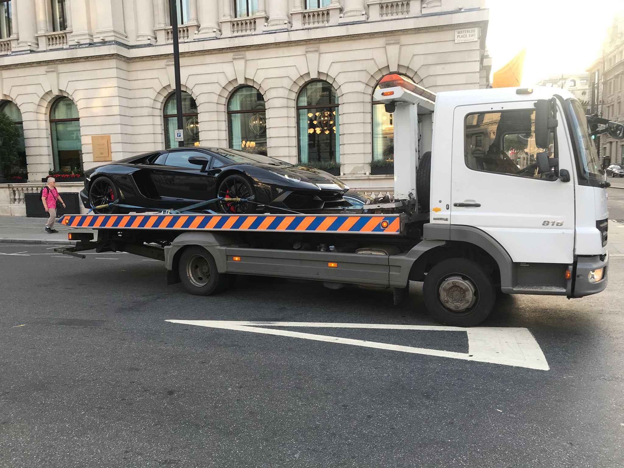 black car towed