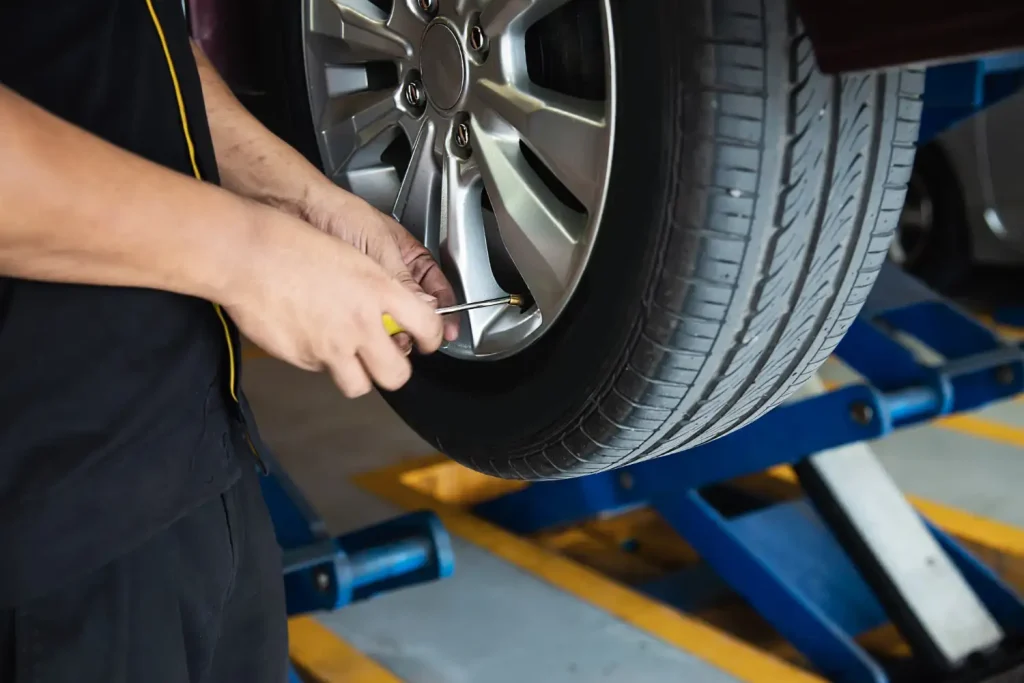 Quick tyre replacement service using spare wheel for stranded vehicles